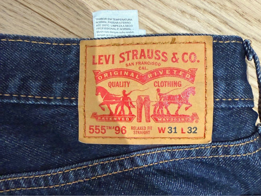 Levi’s 555 - 96” Relaxed Straight Raw Indigo Jeans (Category: Jeans) located in Quezon City. Submitted by joes3 (Listing ID 1470806606, Image 3). Description: Levi’s 555 - 96” Relaxed Straight Raw Indigo Jeans Details: Color: Raw Indigo Size: 31W , 32L Measurements: Length: ~37” Waist: ~16 2/8” Leg Opening: 8.5” Great condition! Like new with no issues!.