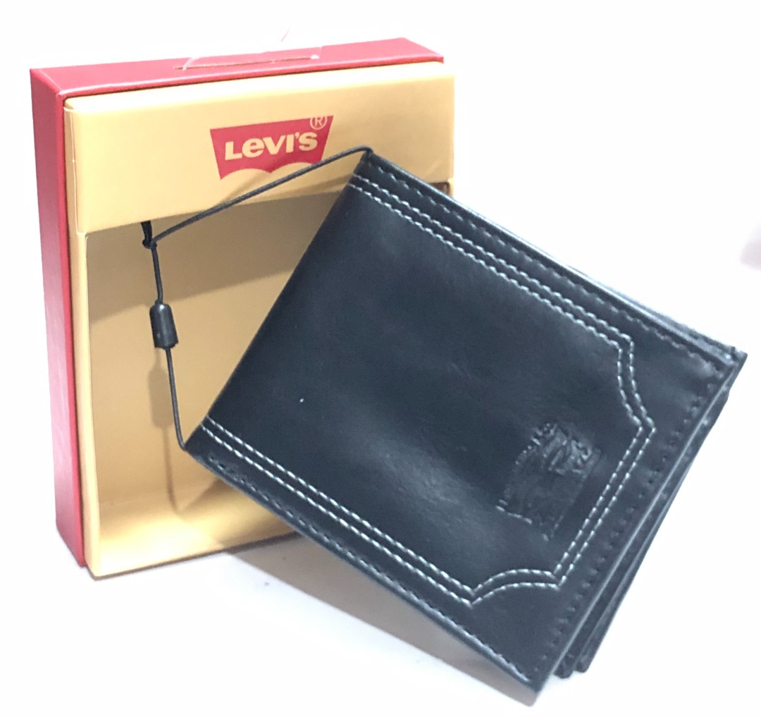 LEVI'S BLACK BIFOLD BILLFOLD LEATHER WALLET $36 (Category: Wallets & Card Holders) located in San Juan City. Submitted by thesouthbeachedit (Listing ID 1470929938, Image 2). Description: BRAND NEW WITH TAG! 100% AUTHENTIC FROM THE U.S.! LEVI'S BLACK BILLFOLD BIFOLD LEATHER WALLET STYLE: 31LP130039 Levi's logo with borderline stitches in front. 9 credit card pockets, 2 side slip pockets provide ample storage for credit, membership and insurance ca