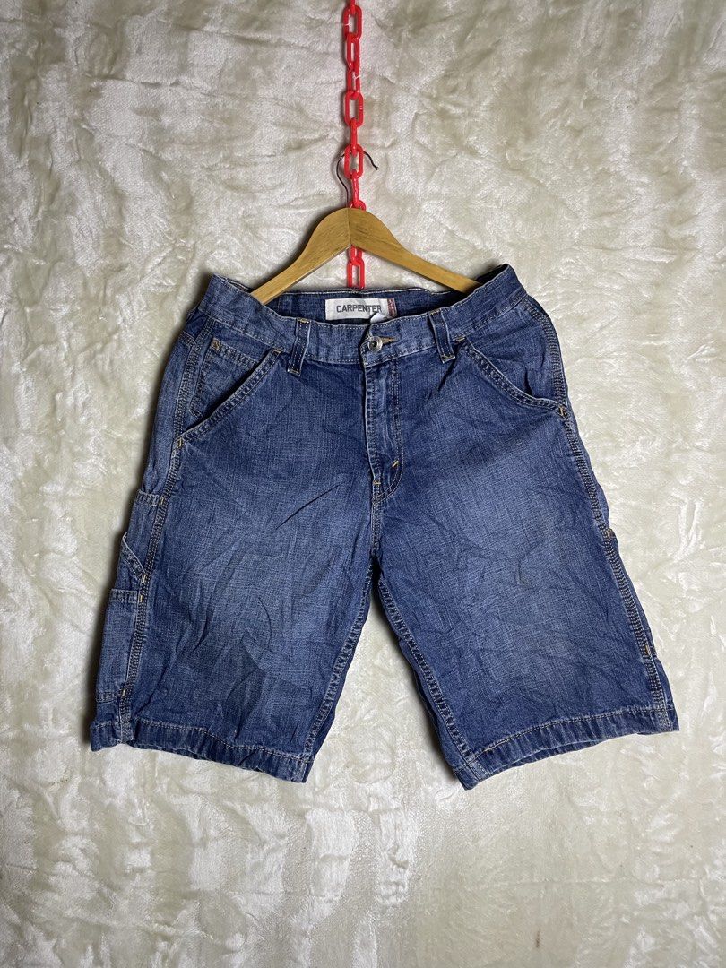 Levi's Carpenter Denim Shorts W29 (Category: Shorts) located in Molave. Submitted by charlesthrifter (Listing ID 1470750822, Image 3). Description: - Brand: Levi's - Style: Denim carpenter shorts with classic blue wash - Size: W29-30waist - Material: 100% cotton (Made in Pakistan) - Features: Standard button fly, utility pockets, side hammer loop, and iconic red tab - Condition: Great casual piece for everyday summer wear.