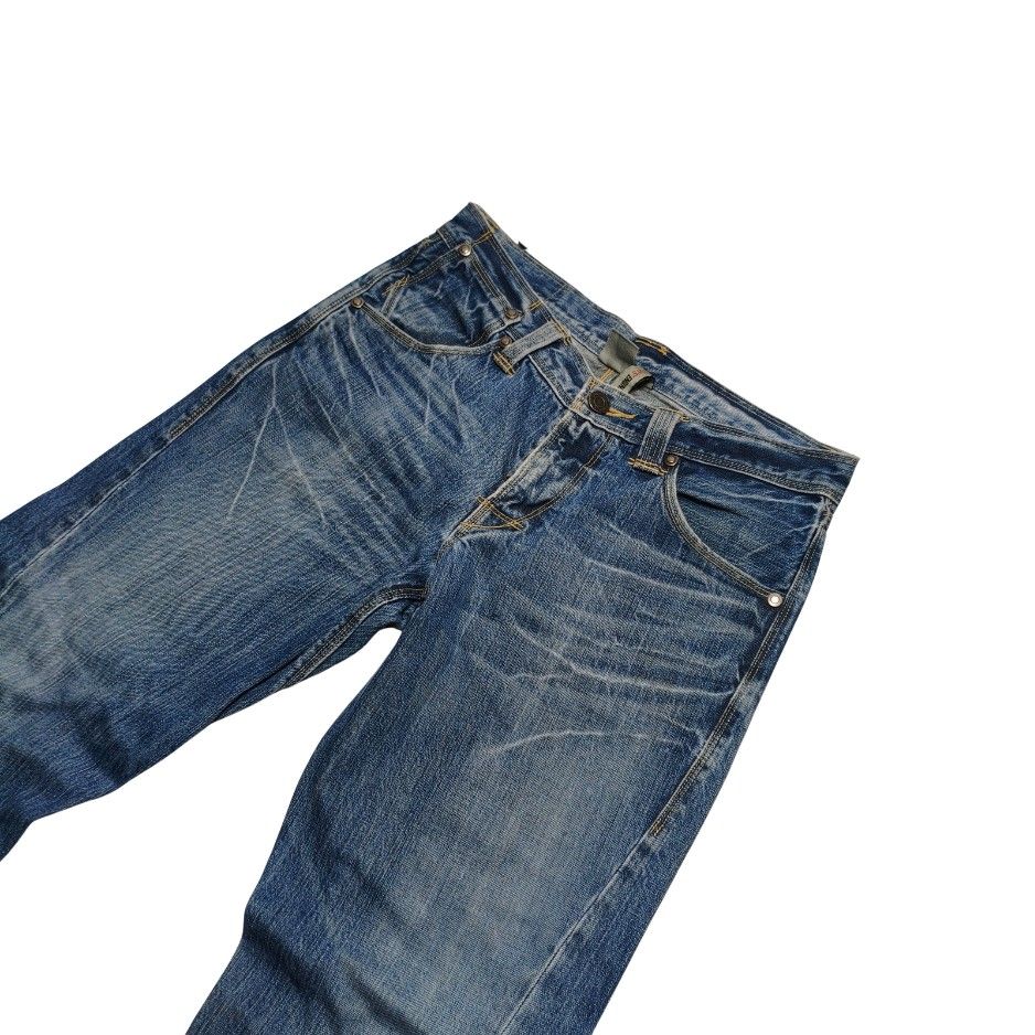 Levi's Engineered Jeans Vintage Denim Pants (Category: Jeans) located in Meycauayan. Submitted by thrifting_gorilla (Listing ID 1470885983, Image 3). Description: Levi's Engineered Jeans Vintage Denim Pants - Brand/Model: Vintage Levi's Engineered Jeans (1999 Collection) - Color/Wash: Classic blue with natural faded whiskering - Key Features: Distinctive twisted leg seams, unique back pocket design, and button fly closure - Condition: Heavy fade 