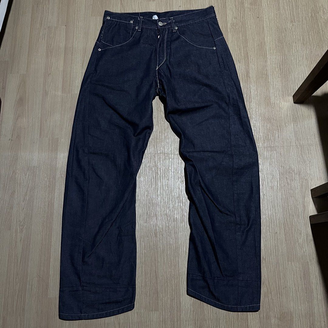 Levi's Engineered Jeans W30 L30 Made in Japan (Category: Jeans) located in Davao. Submitted by streetsight (Listing ID 1470854965, Image 1). Description: - Brand/Model: Levi's Engineered Jeans - Size: W30 L30 - Material: 100% Cotton, Crafted in Japan - Wash: Dark indigo with crisp contrast stitching - Fit: Straight, relaxed fit through the leg - Details: Unique twisted seam design with curved legs, classic button fly, and signature red tab.