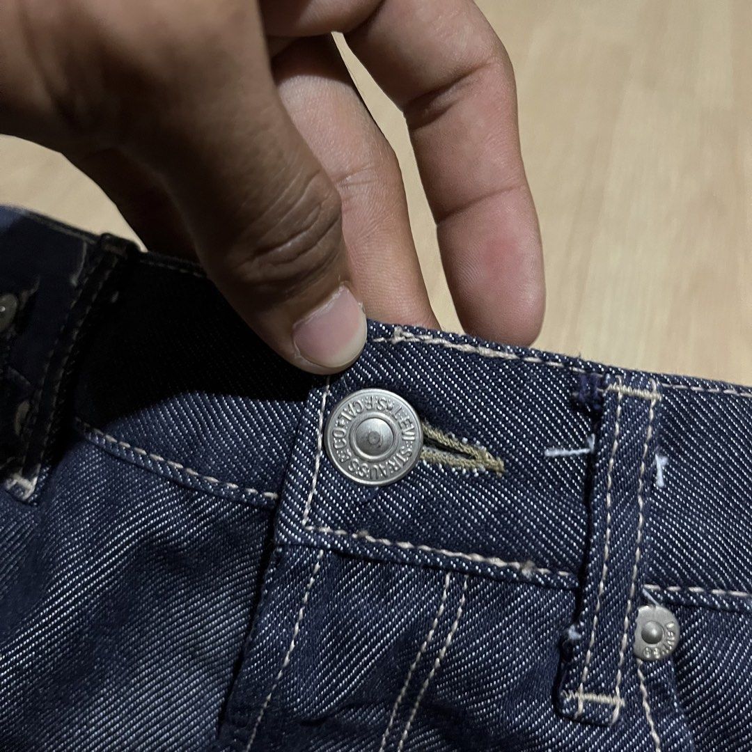Levi's Engineered Jeans W30 L30 Made in Japan (Category: Jeans) located in Davao. Submitted by streetsight (Listing ID 1470854965, Image 2). Description: - Brand/Model: Levi's Engineered Jeans - Size: W30 L30 - Material: 100% Cotton, Crafted in Japan - Wash: Dark indigo with crisp contrast stitching - Fit: Straight, relaxed fit through the leg - Details: Unique twisted seam design with curved legs, classic button fly, and signature red tab.