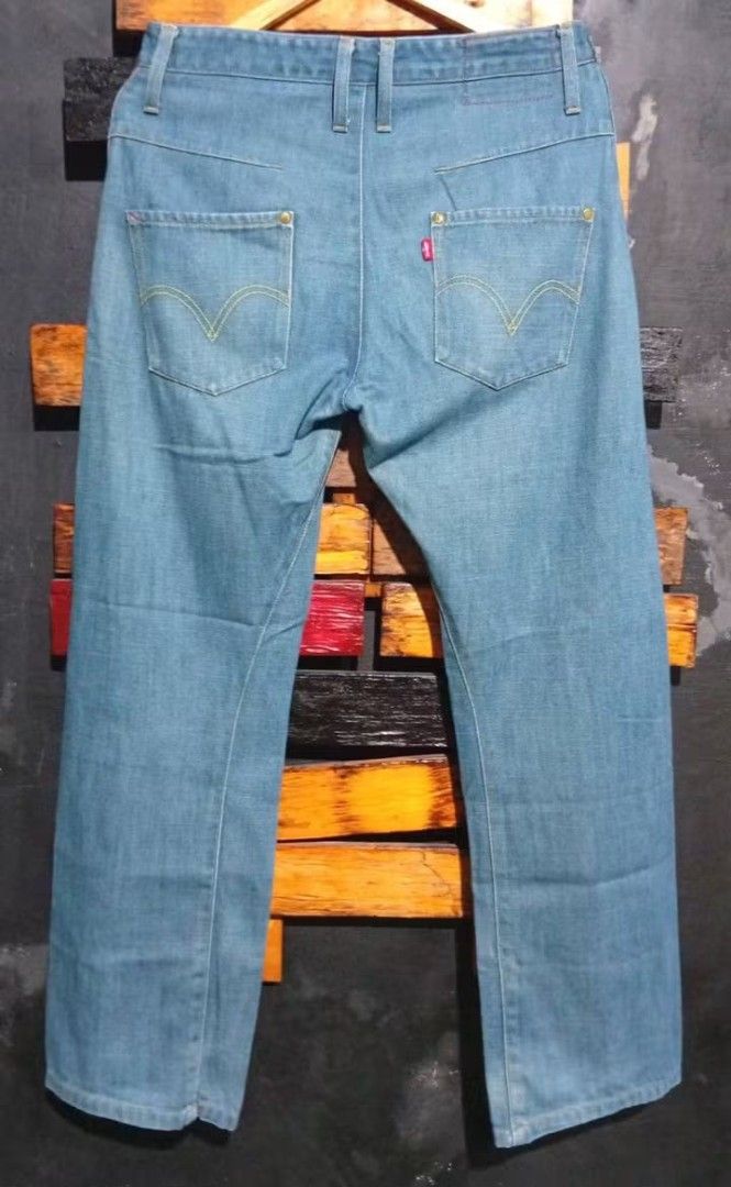 Levi's Light Blue Denim Jeans (Category: Jeans) located in Manila. Submitted by fastdragon_62f8c6 (Listing ID 1470853161, Image 2). Description: Light wash Levi's denim jeans. Classic 5-pocket styling with arcuate stitch on the back pockets, branded rivets, and signature red tab. Straight leg fit with unique front panel seam details. Clean denim finish, button fly closure with metal waist button. Versatile piece for daily casual wear..