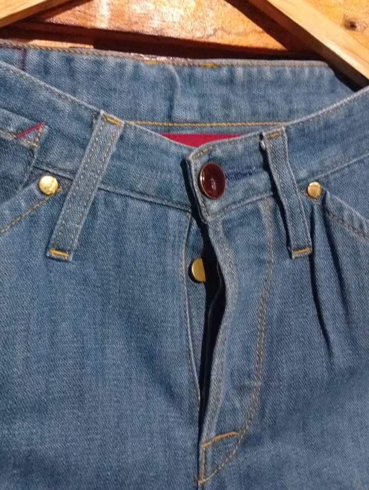 Levi's Light Blue Denim Jeans (Category: Jeans) located in Manila. Submitted by fastdragon_62f8c6 (Listing ID 1470853161, Image 3). Description: Light wash Levi's denim jeans. Classic 5-pocket styling with arcuate stitch on the back pockets, branded rivets, and signature red tab. Straight leg fit with unique front panel seam details. Clean denim finish, button fly closure with metal waist button. Versatile piece for daily casual wear..