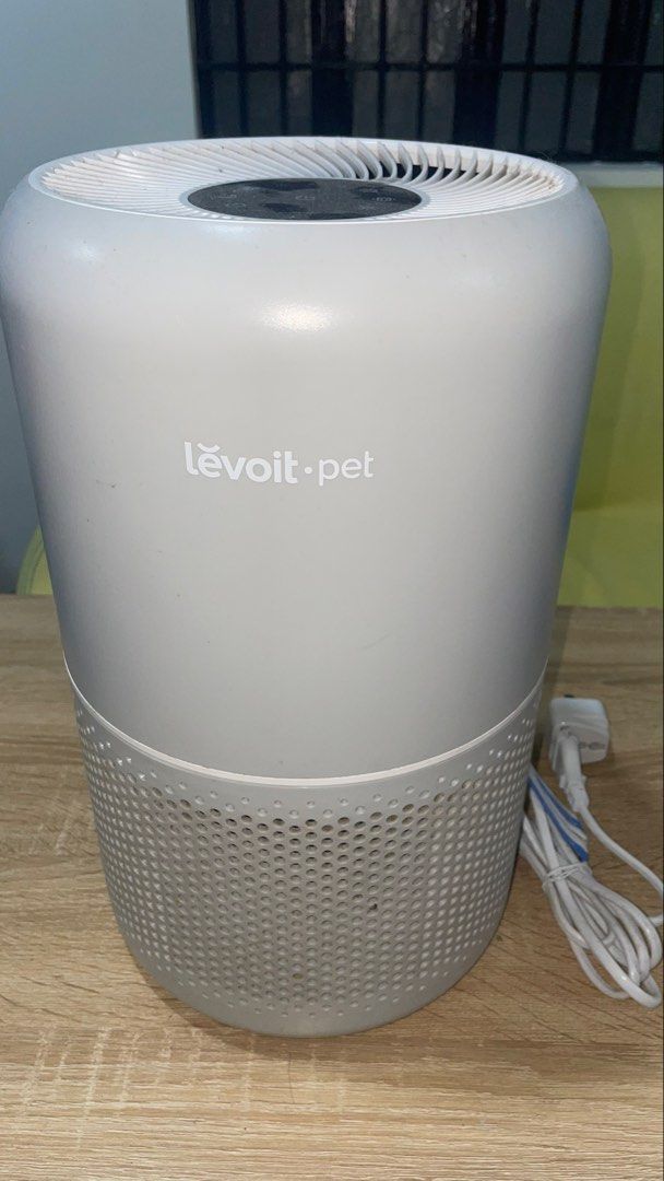 Levoit Pet Air Purifier (Category: Air Purifiers & Dehumidifiers) located in Manila. Submitted by astrida21 (Listing ID 1470893022, Image 1). Description: - Brand: Levoit Pet Air Purifier - Color: Grey - Ideal for pet owners: Effectively removes pet hair, dander, and household odours - Controls: Convenient top control panel with adjustable fan speeds and timer settings - Design: Circular body with bottom intake grill - Inclusions: Comes with powe