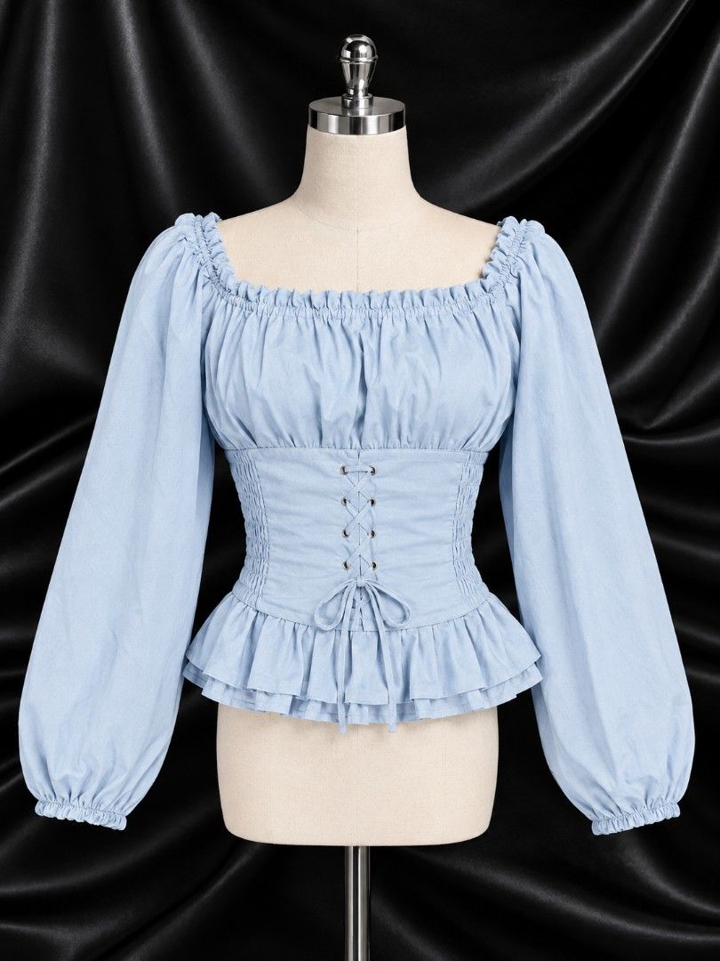 Light Blue Corset Peasant Blouse Off-Shoulder Top (Category: Blouses) located in Bulacan. Submitted by hd.619809 (Listing ID 1470848511, Image 2). Description: S-M - Color: Light blue - Style: Peasant blouse with lace-up corset bodice and grommet ribbon tie - Neckline: Versatile square neckline (can be worn off-shoulder) - Sleeves: Long balloon sleeves with elastic cuffs - Fit: Smocked side panels for extra stretch and comfort - Hem: Double-layer