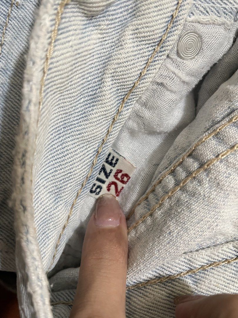 Light Wash Denim Jeans Size 26 (Category: Jeans) located in Manila. Submitted by ysadeclutters (Listing ID 1470803816, Image 2). Description: 150 for three jeans - Style: Light wash denim jeans - Size: 26 (tag attached inside waistband) - Details: Classic blue denim with tan contrast stitching - Closure: Metal button front with standard belt loops - Condition: Pre-owned, clean inside lining.