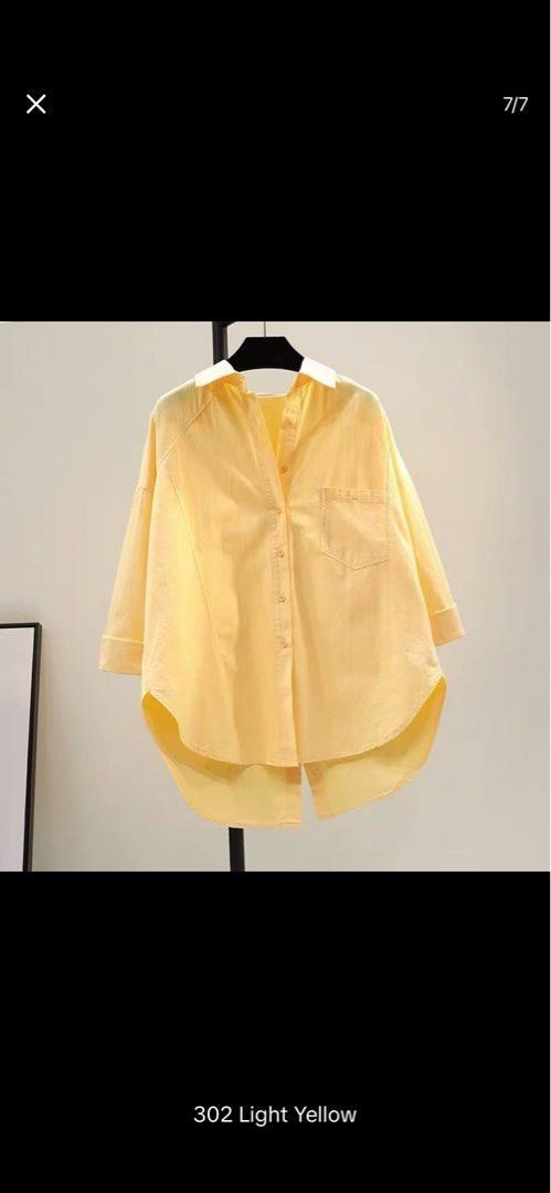 Light Yellow Oversized Button-Down Shirt (Category: Shirts) located in Kawit. Submitted by summer.731 (Listing ID 1470767910, Image 1). Description: - Color: Light yellow with contrast white collar - Fit: Oversized, relaxed, slouchy fit - Details: Single left chest pocket, high-low curved hem - Sleeves: Long sleeves (can be worn rolled up) - Style: Casual, chic button-down shirt.