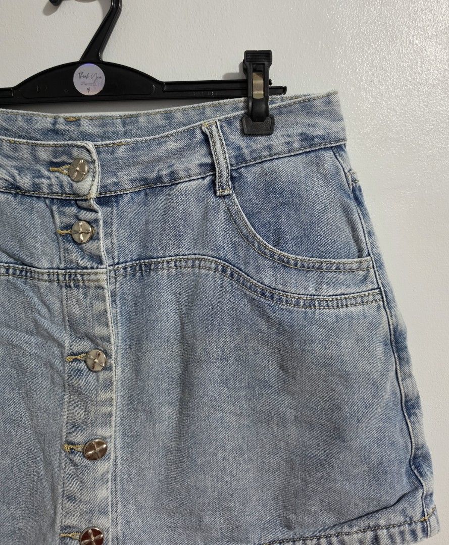Lightwash Denim Skorts Button-Down Front (Category: Shorts) located in Paranaque City. Submitted by franinnashop (Listing ID 1470842241, Image 2). Description: Declutter - Style: Casual everyday lightwash denim skorts - Design: High waist fit with built-in shorts underneath for extra comfort and coverage - Closure & Details: Front button-down closure with five silver buttons, two front pockets, and two back pockets - Measurements: Waist: 32 inche