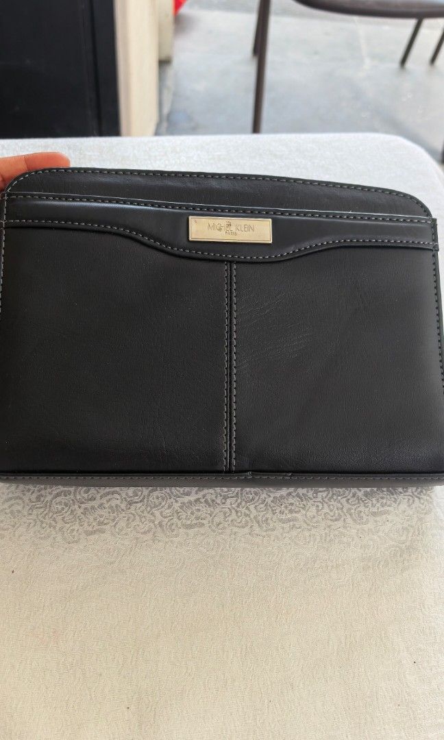 Like new Michael Klein black Clutch (Category: Clutches) located in Tuguegarao City. Submitted by zenphoenix-7ad615 (Listing ID 1470787266, Image 1). Description: Michael Klein black Like new.