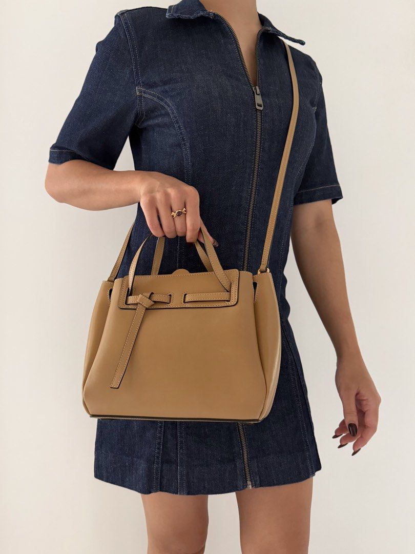 Loewe Lazo Mini in Dune Smooth Calfskin (Category: Luxury Bags & Wallets) located in Quezon City. Submitted by lian_closet (Listing ID 1470797158, Image 2). Description: Loewe Lazo Mini in Dune Smooth Calfskin Best Price: ₱38,000 Preloved Comes with Certificate Card, Care Booklet, Generic Dust Bag & LegitGrails Authenticity Certificate Preloved Rating: 9/10 Excellent Superficial scratches on the body Hardly any corner wear Interior is clean but h
