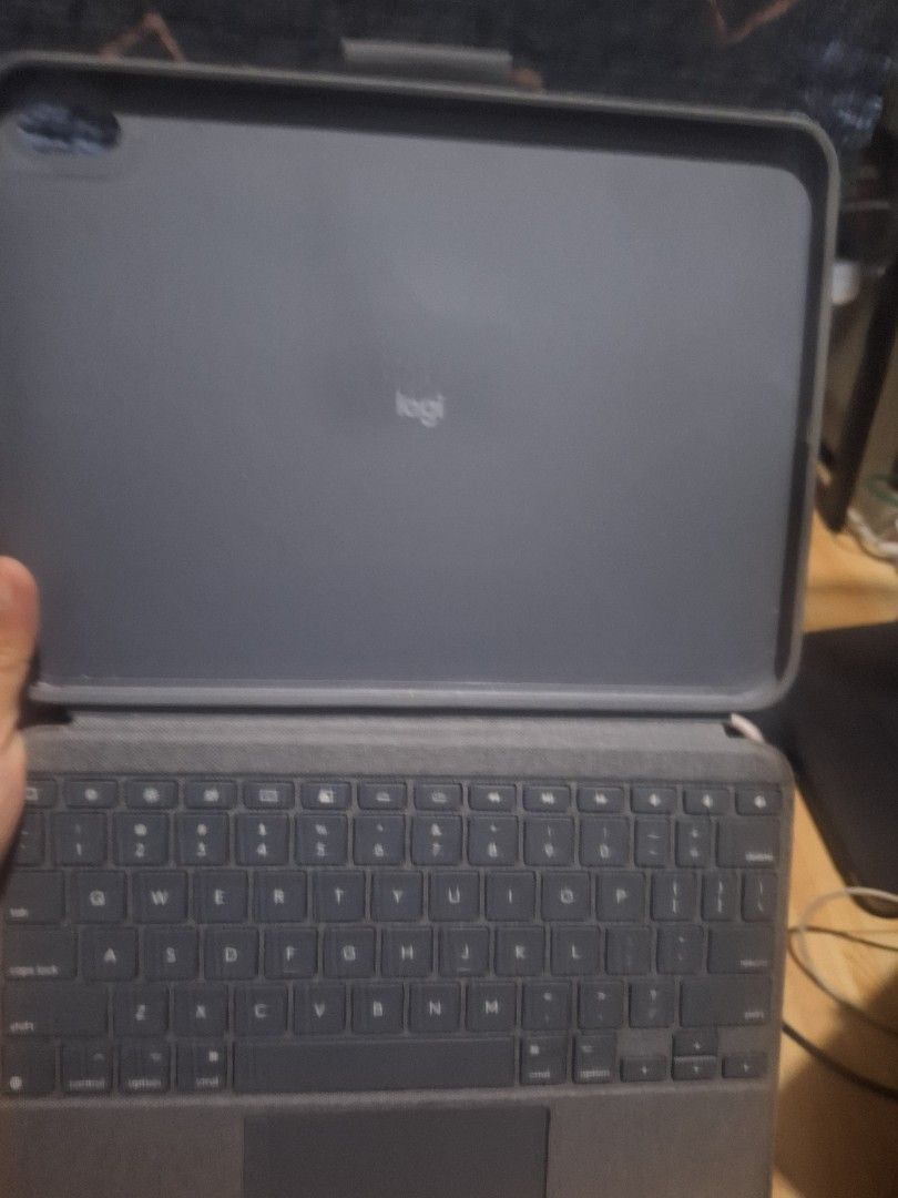 Logitech Combo Touch Keyboard Trackpad Case iPad 10th Gen (Category: Cases & Sleeves) located in Quezon City. Submitted by choeyyy.19 (Listing ID 1470868344, Image 3). Description: - Compatibility: Made exclusively for iPad 10th Generation - Color/Material: Stylish dark grey woven fabric exterior - Versatility: Detachable keyboard with type, sketch, view, and read modes - Performance: Large, high-precision trackpad and adjustable backlit keys - C