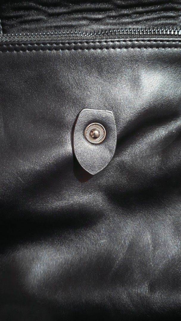 Longchamp Black Leather Backpack (Category: Luxury Bags & Wallets) located in Quezon City. Submitted by sureandlegit (Listing ID 1470902722, Image 3). Description: For Sale Longchamp Extra M Full Leather Backpack Noir color With 1 zip pocket and 1 open pocket inside. Can fit 13 - 15inch laptop Made in Tunisia Slightly used, good as brand new Bought from Japan 2nd hand shop Bought for 7,500 after tax refund Bag only Can provide LC ziplock packagin
