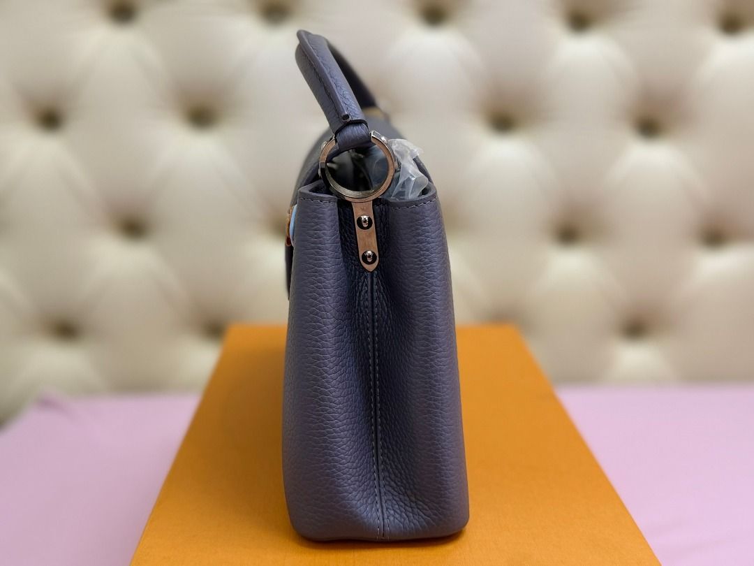 Louis Vuitton Capucines BB (Category: Luxury Bags & Wallets) located in Famy. Submitted by azgeda (Listing ID 1470853106, Image 2). Description: Color: Gray Hardware: Silver Rarely used --------- Inclusions: box dustbag -------- Asking price is listed Accepting Offers.