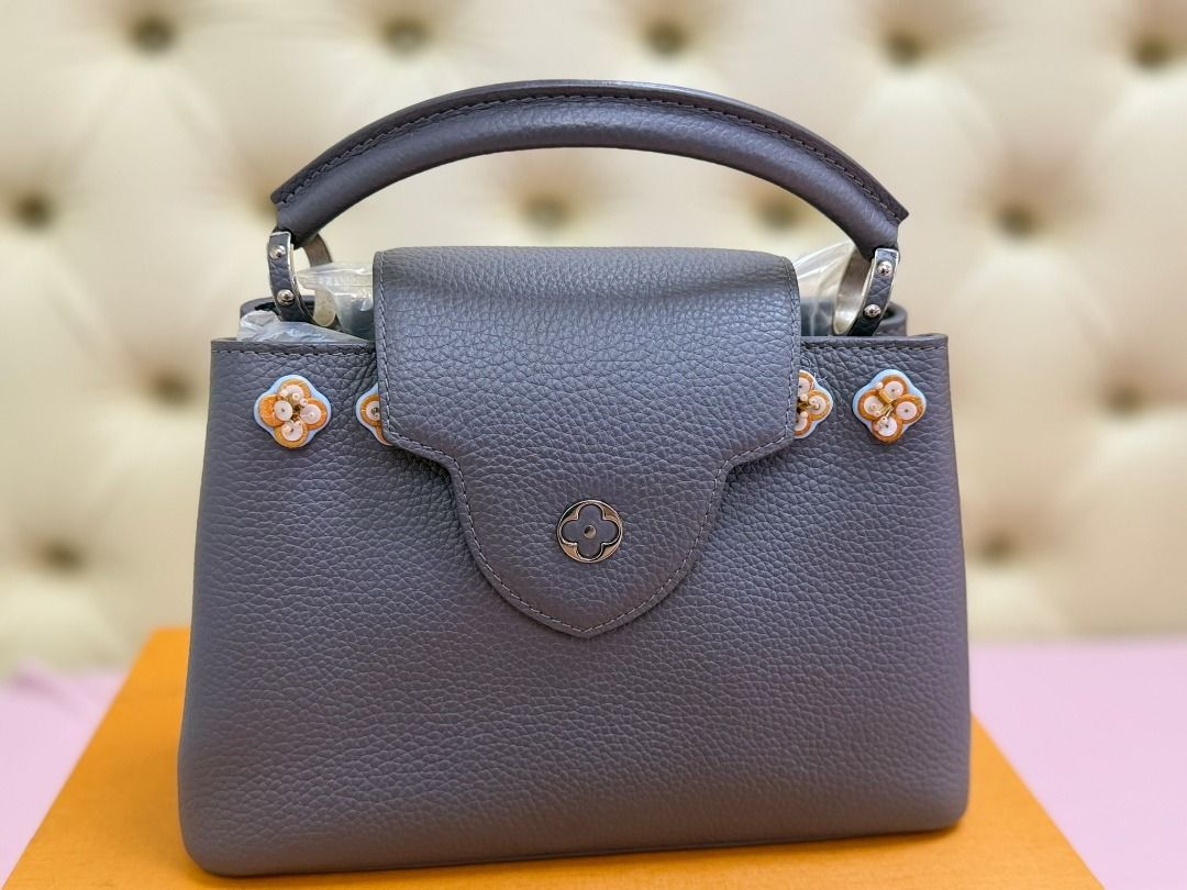 Louis Vuitton Capucines BB (Category: Luxury Bags & Wallets) located in Famy. Submitted by azgeda (Listing ID 1470853106, Image 1). Description: Color: Gray Hardware: Silver Rarely used --------- Inclusions: box dustbag -------- Asking price is listed Accepting Offers.