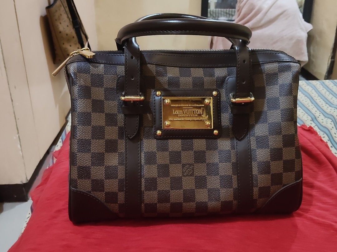Louis Vuitton Damier Ebene Handbag (Category: Luxury Bags & Wallets) located in Cebu City. Submitted by almzcorner (Listing ID 1470781690, Image 1). Description: - Authentic Louis Vuitton handbag in timeless Damier Ebene canvas - Elegant dark brown leather trim and polished brass hardware - Secure zip top closure with dual engraved zipper pulls - Features the prominent gold-tone Louis Vuitton Inventeur plaque on the front - Clean, structured shap