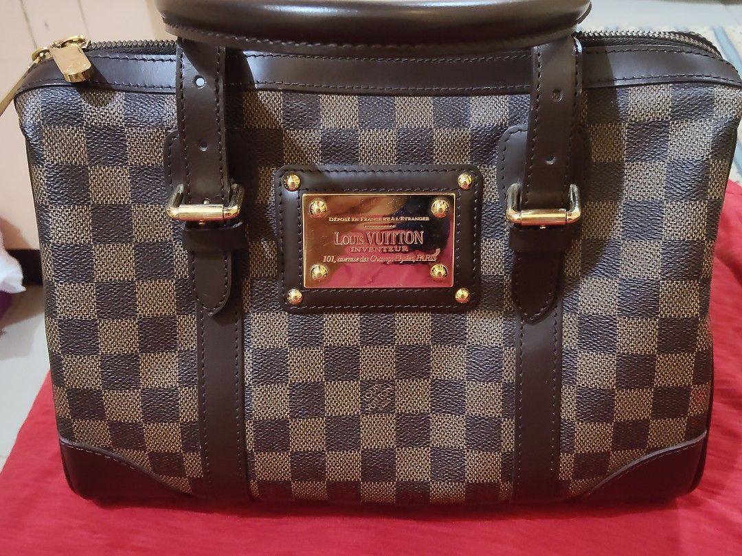 Louis Vuitton Damier Ebene Handbag (Category: Luxury Bags & Wallets) located in Cebu City. Submitted by almzcorner (Listing ID 1470781690, Image 2). Description: - Authentic Louis Vuitton handbag in timeless Damier Ebene canvas - Elegant dark brown leather trim and polished brass hardware - Secure zip top closure with dual engraved zipper pulls - Features the prominent gold-tone Louis Vuitton Inventeur plaque on the front - Clean, structured shap