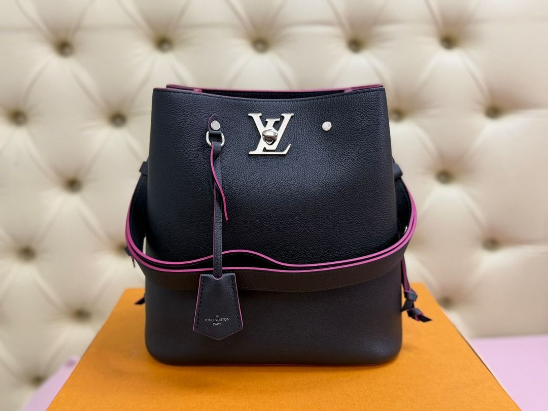 LOUIS VUITTON Lockme Bucket (Category: Luxury Bags & Wallets) located in Famy. Submitted by azgeda (Listing ID 1470852882, Image 1). Description: Color: Noir/Hot Pink Rarely used --------- Inclusions: box dustbag -------- Asking price is listed Accepting Offers.