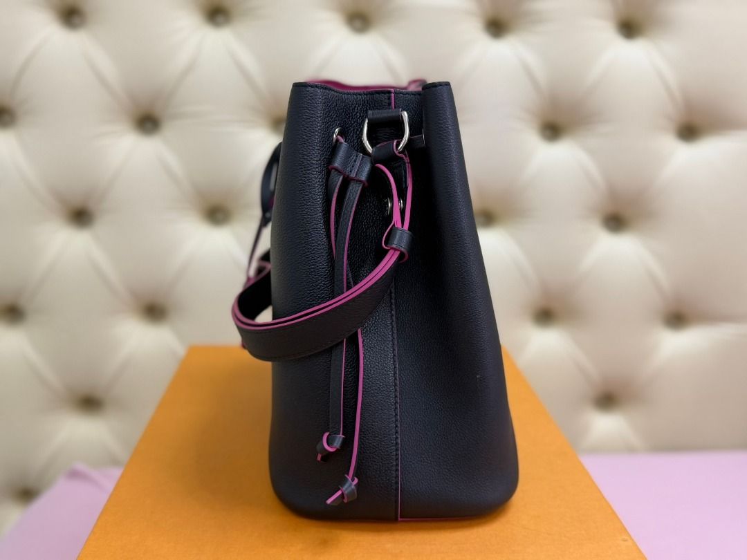 LOUIS VUITTON Lockme Bucket (Category: Luxury Bags & Wallets) located in Famy. Submitted by azgeda (Listing ID 1470852882, Image 2). Description: Color: Noir/Hot Pink Rarely used --------- Inclusions: box dustbag -------- Asking price is listed Accepting Offers.