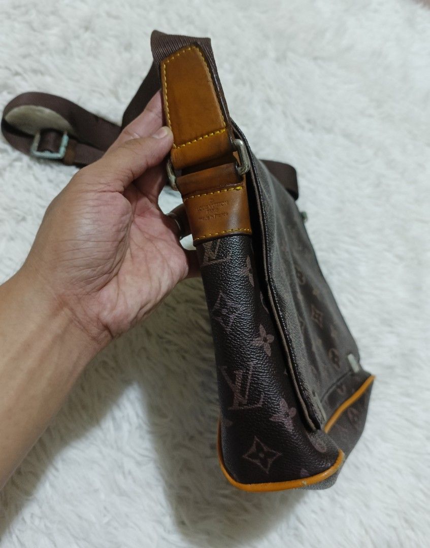 Louis Vuitton Monogram Messenger Bag Brown (Category: Luxury Bags & Wallets) located in Quezon City. Submitted by lootsniwoah_12 (Listing ID 1470886632, Image 2). Description: - Authentic brown Louis Vuitton messenger bag with classic monogram pattern - Adjustable fabric strap with durable metal hardware - Secure front flap closure with magnetic buttons - Premium leather trim with embossed Louis Vuitton Paris made in France branding - Spacious ma