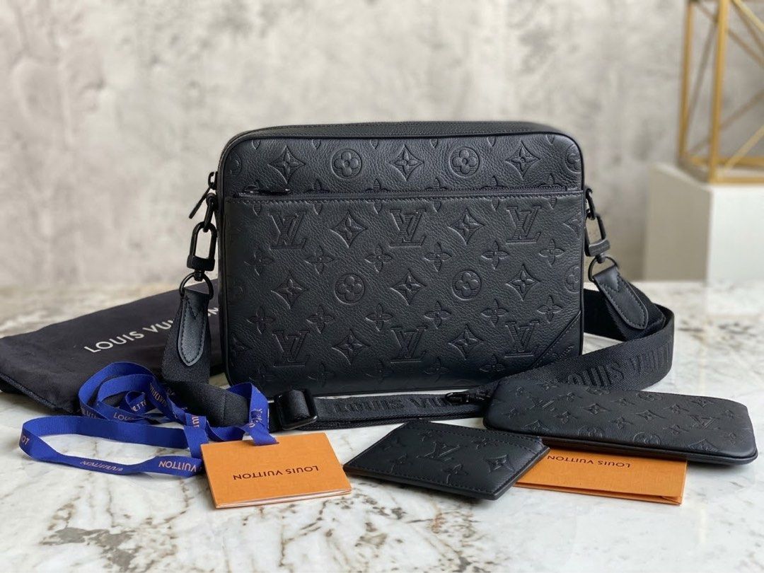 Louis Vuitton Monogram Shadow Leather Messenger Bag Set (Category: Luxury Bags & Wallets) located in Manila. Submitted by yanyancm (Listing ID 1470872494, Image 1). Description: - Brand: Louis Vuitton - Color: Black with tonal hardware - Material: Embossed monogram soft grained leather - Features: Main compartment, front zip pocket, and adjustable branded shoulder strap - Includes: Matching coin pouch, card holder, dust bag, tags, ribbon, box, pa