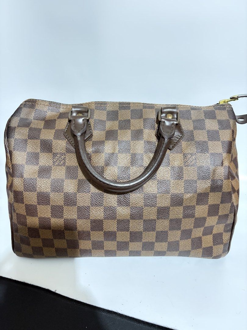 louis vuitton speedy 30 damier ebene (Category: Luxury Bags & Wallets) located in Bay. Submitted by bunini7 (Listing ID 1470796427, Image 3). Description: with legit app certificate change puller authentic.