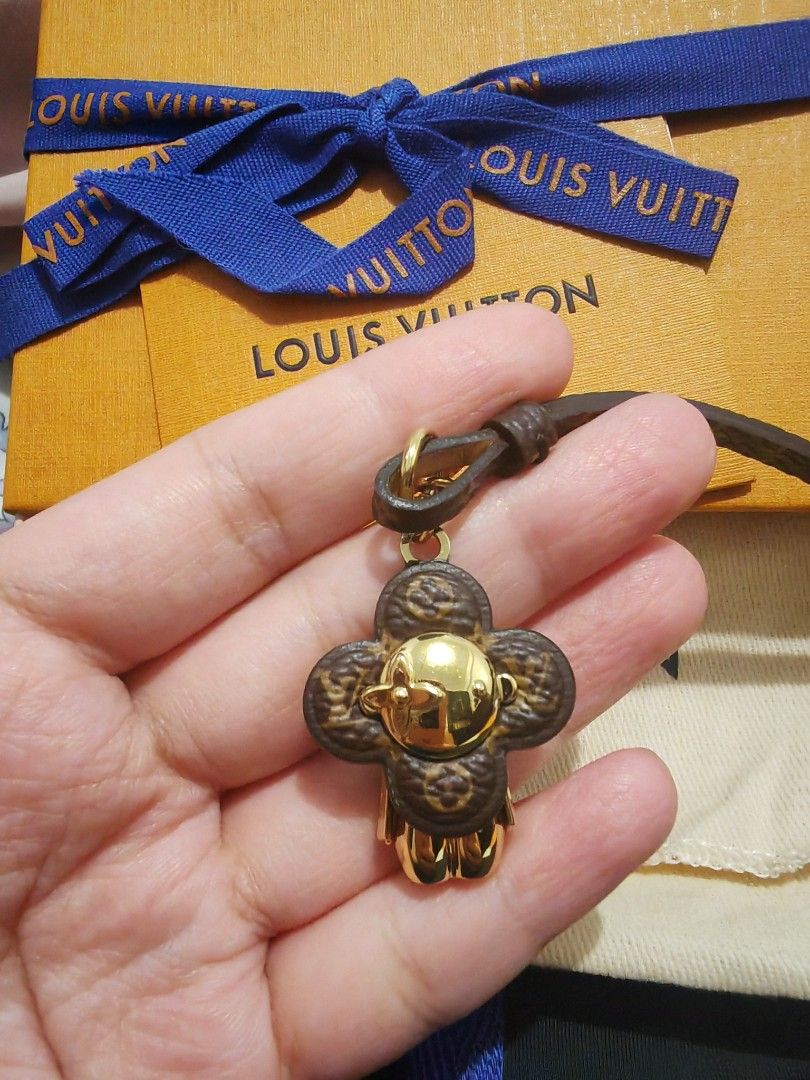 Louis Vuitton Vivienne Mascot Bag Charm Monogram (Category: Charms) located in Quezon City. Submitted by sashasarisarishoppe (Listing ID 1470871145, Image 3). Description: - Brand: Louis Vuitton Vivienne bag charm - Features: Monogram canvas strap with gold-tone hardware - Inclusions: Complete with receipt, original box, and dust pouch - Use: Great accessory for bags or keys or phone charm - With receipt, bought in LV store in Malaysia for 33k+ i