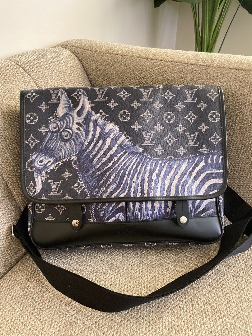 Louis Vuitton Zebra Print Monogram Messenger Bag (Category: Luxury Bags & Wallets) located in Pagadian. Submitted by everbeauxsacs (Listing ID 1470761931, Image 1). Description: - Brand: Louis Vuitton - Design: Rare black and white zebra graphic on classic monogram canvas - Material: Premium monogram canvas with black leather trim - Strap: Adjustable black shoulder strap for comfortable wear - Pockets: Front pockets with secure metal snap buttons