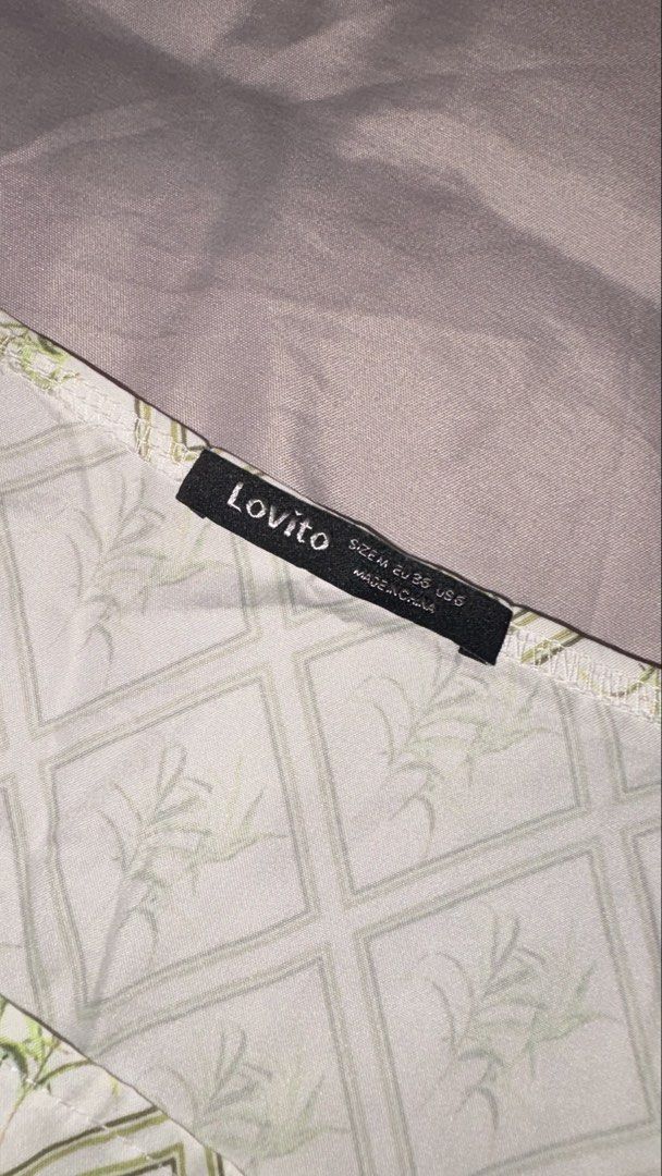 Lovito green floral pattern square neck long sleeve top (Category: Longsleeves) located in Quezon City. Submitted by shrlane (Listing ID 1470889888, Image 2). Description: - Brand: Lovito - Style: Square neck top with long sleeves - Design: Green and white pattern with diamonds and botanical prints - Size: Medium (EU 36, US 6) - Material: Lightweight fabric - Condition: Worn once, still in great shape.