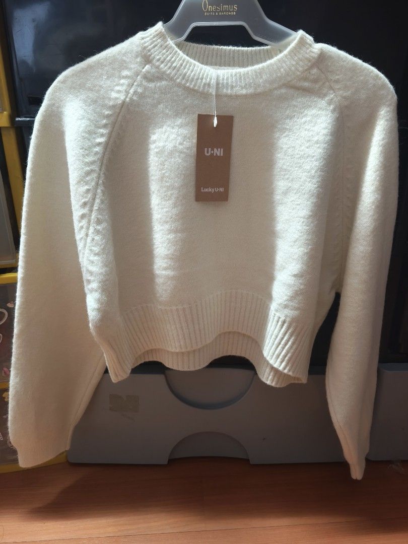 Lucky U-NI White Cropped Knit Sweater (Category: Longsleeves) located in Quezon City. Submitted by ng.stephanielauren (Listing ID 1470877933, Image 1). Description: - Brand: U-NI (Brand new with tags) - Color: Cream White / Solid Neutral - Material: Soft knit - Features: Crew neckline, long sleeves, ribbed hem and cuffs - Styling: Easy to match with high-waist pants or skirts.