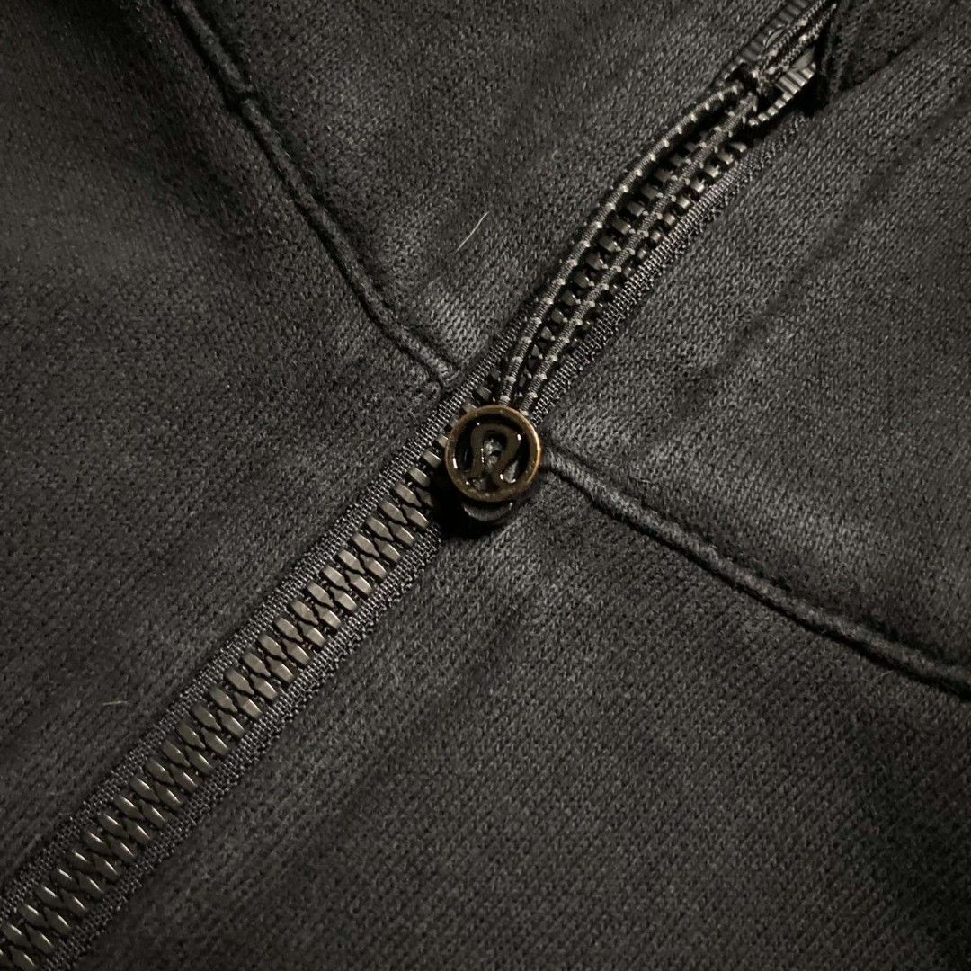 Lululemon Black Full-Zip Hoodie (Category: Coats, Jackets and Outerwear) located in San Pablo. Submitted by refitsph (Listing ID 1470788759, Image 3). Description: - Width: 24 - Length: 21 - Legit / Authentic - Issue: sign of use - Excellent Condition - Already Washed and Ready to Wear.