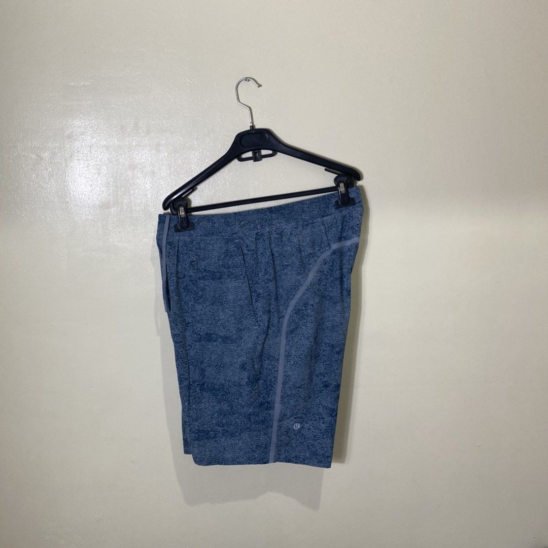 Lululemon Blue Athletic Shorts Size L (Category: Activewear) located in Cebu City. Submitted by theloose.thread (Listing ID 1470918207, Image 2). Description: - Brand: Lululemon - Color: Blue with textured pattern - Size: Large (tag inside zippered pocket, size dot on inner waistband) - Features: Built-in liner, adjustable drawstring waistband, and secure zippered side pocket - Condition: Excellent - Best for: Running, workouts, and active lifest