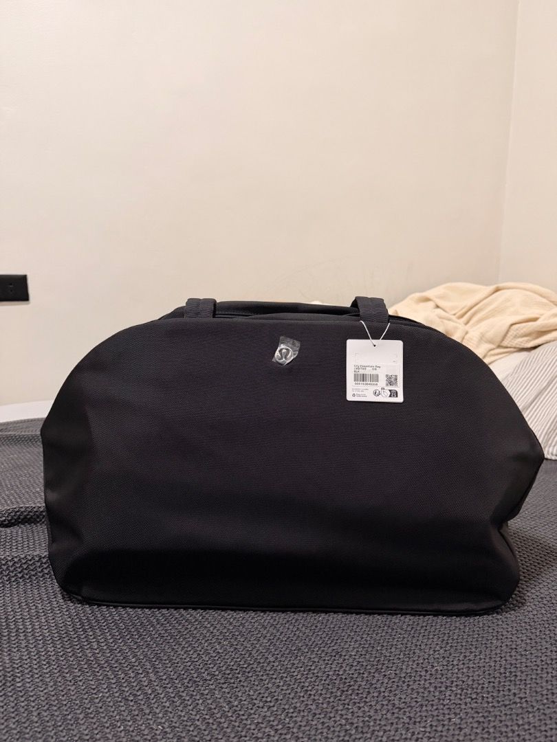 Lululemon City Essentials in 25L (Category: Tote Bags) located in Quezon City. Submitted by kkkbm013 (Listing ID 1470848619, Image 2). Description: Lululemon City Essentials in 25L Brand new with tags and lulu ecobag Guaranteed Authentic Perfect for Gym, Pickleball BAG! Love this bag sm! SF via J&T.