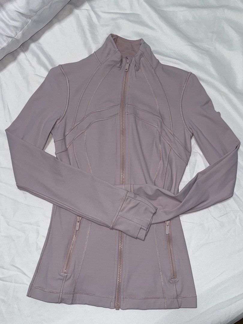 Lululemon Define Jacket Pink Mauve Size 4 (Category: Coats, Jackets and Outerwear) located in Taguig. Submitted by xiurecsz (Listing ID 1470869828, Image 1). Description: - Lululemon Define Jacket - Size: 4 (fabric tag attached).
