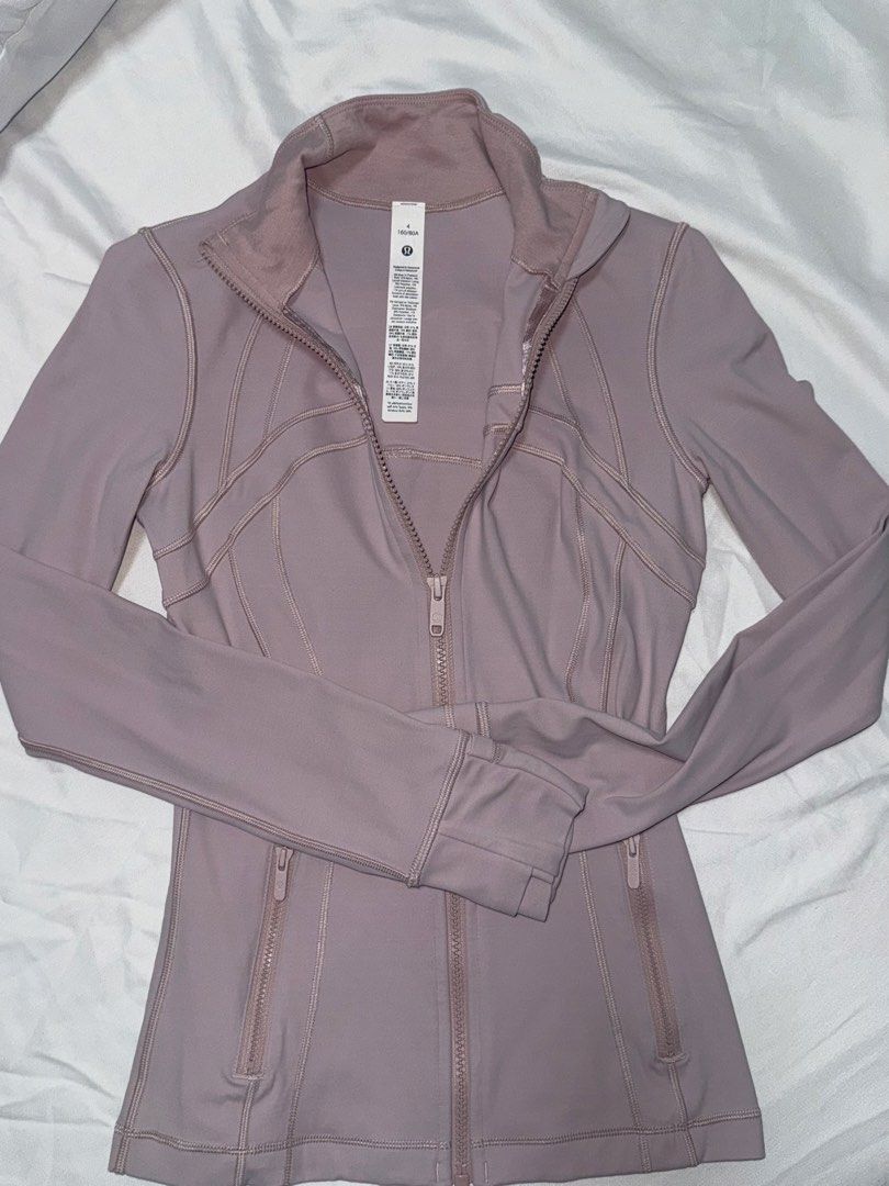 Lululemon Define Jacket Pink Mauve Size 4 (Category: Coats, Jackets and Outerwear) located in Taguig. Submitted by xiurecsz (Listing ID 1470869828, Image 2). Description: - Lululemon Define Jacket - Size: 4 (fabric tag attached).