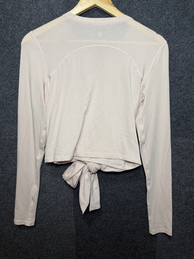 Lululemon Long Sleeve Tie Front Crop Top (Category: Longsleeves) located in Baguio. Submitted by thriftcoded_2600 (Listing ID 1470862490, Image 3). Description: - Lululemon - Excellent Condition - Color rate:10/10 - Size: Small-Medium -16.5x18 -Authentic .