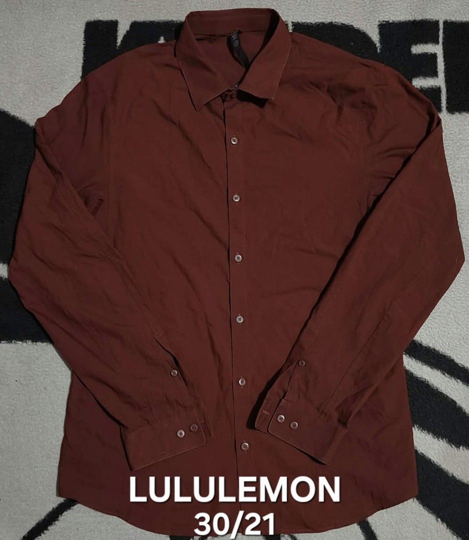 Lululemon Men's Long Sleeve Button Down Shirt Size L (Category: Formal Shirts) located in San Fernando, Camarines Sur. Submitted by ladderaya (Listing ID 1470817224, Image 1). Description: - Brand: Lululemon - Item: Long Sleeve Button-Down Shirt - Condition: Brand new with tags attached - Size: L - Color: Rich brick red - Material: 61% cotton, 32% polyester, 7% lycra elastane - Features: Classic collar, front button closure, buttoned cuffs, and '