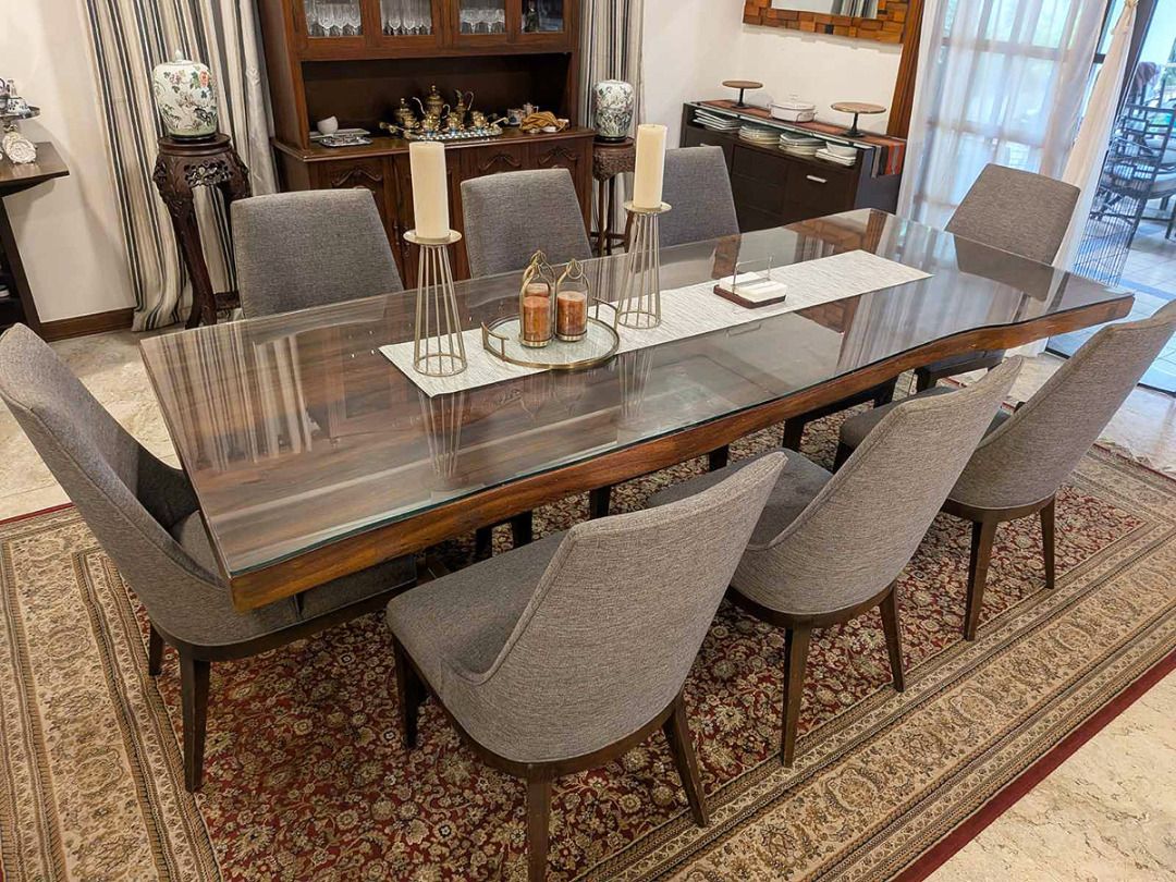 Luxurious 8-Seater Dining Table Set (Large) Tempered Glass top (Category: Tables & Sets) located in Bacoor. Submitted by rdeveyra (Listing ID 1470758161, Image 1). Description: Luxurious 8-Seater dining table set for sale. Large size (measures 110in L x 44in W x 30.5in H). High quality 0.5in tempered glass top. Selling as a whole set. For pick-up only in Makati. PM me for faster transactions and/or inquiries..