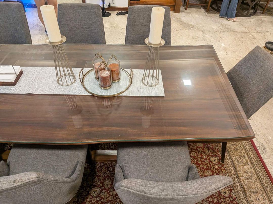 Luxurious 8-Seater Dining Table Set (Large) Tempered Glass top (Category: Tables & Sets) located in Bacoor. Submitted by rdeveyra (Listing ID 1470758161, Image 2). Description: Luxurious 8-Seater dining table set for sale. Large size (measures 110in L x 44in W x 30.5in H). High quality 0.5in tempered glass top. Selling as a whole set. For pick-up only in Makati. PM me for faster transactions and/or inquiries..