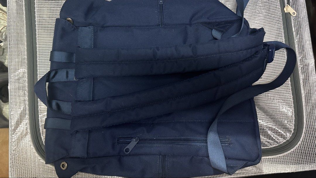 MAH Blue Backpack with Buckle Straps (Category: Backpacks) located in Pasig City. Submitted by thingsimselling_jdl (Listing ID 1470780591, Image 2). Description: - Brand: MH - Color: Navy blue - Design: Clean lines with sturdy everyday utility - Closure: Front flap with dual plastic snap-buckles - Comfort: Adjustable padded shoulder straps - Storage: Functional compartments plus a secure back zip pocket.