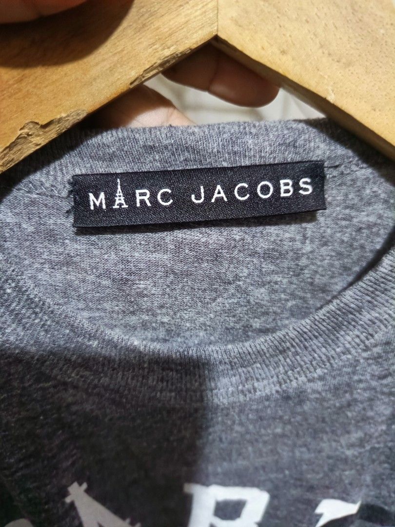 Marc Jacobs Shirt (Category: Luxury Apparel) located in Cebu City. Submitted by negotiableprice22 (Listing ID 1470926731, Image 3). Description: Marc Jacobs Shirt size Small on tag made in USA Dimes Width 17.5 inch Length 25.5 inch very good fit , stretchable available accepting offers.