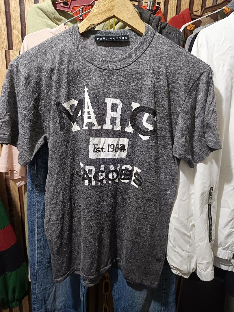 Marc Jacobs Shirt (Category: Luxury Apparel) located in Cebu City. Submitted by negotiableprice22 (Listing ID 1470926731, Image 2). Description: Marc Jacobs Shirt size Small on tag made in USA Dimes Width 17.5 inch Length 25.5 inch very good fit , stretchable available accepting offers.