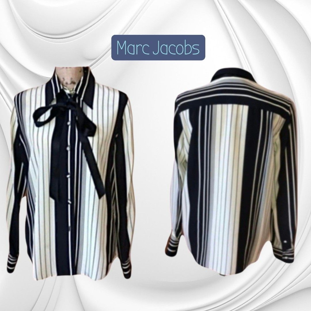 Marc Jacobs Striped Pussybow Blouse (Category: Blouses) located in Paranaque City. Submitted by calm_youngstore7 (Listing ID 1470748429, Image 2). Description: 80% OFF RETAIL! LAST PIECE SALE! - Brand: Marc Jacobs - Style: Button-down blouse with black and cream vertical stripes - Features: Long sleeves, pointed collar, and built-in black silk ribbon tie at the neck - Condition: Brand new with original retail tags attached - Perfect for office we