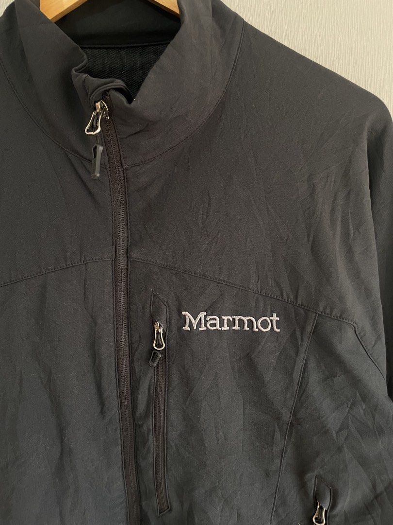 Marmot M3 Softshell Jacket Black Men's Size L (Category: Coats, Jackets and Outerwear) located in Mataasnakahoy. Submitted by zero4thrift (Listing ID 1470777350, Image 2). Description: - Brand: Marmot - Model: M3 Softshell Jacket - Size: Large - Color: Black - Full zip front with high collar for extra warmth - 1 zippered chest pocket and 2 zippered hand pockets - Lightweight and breathable fabric with 'M3 Softshell' cuff embroidery - Perfect for 