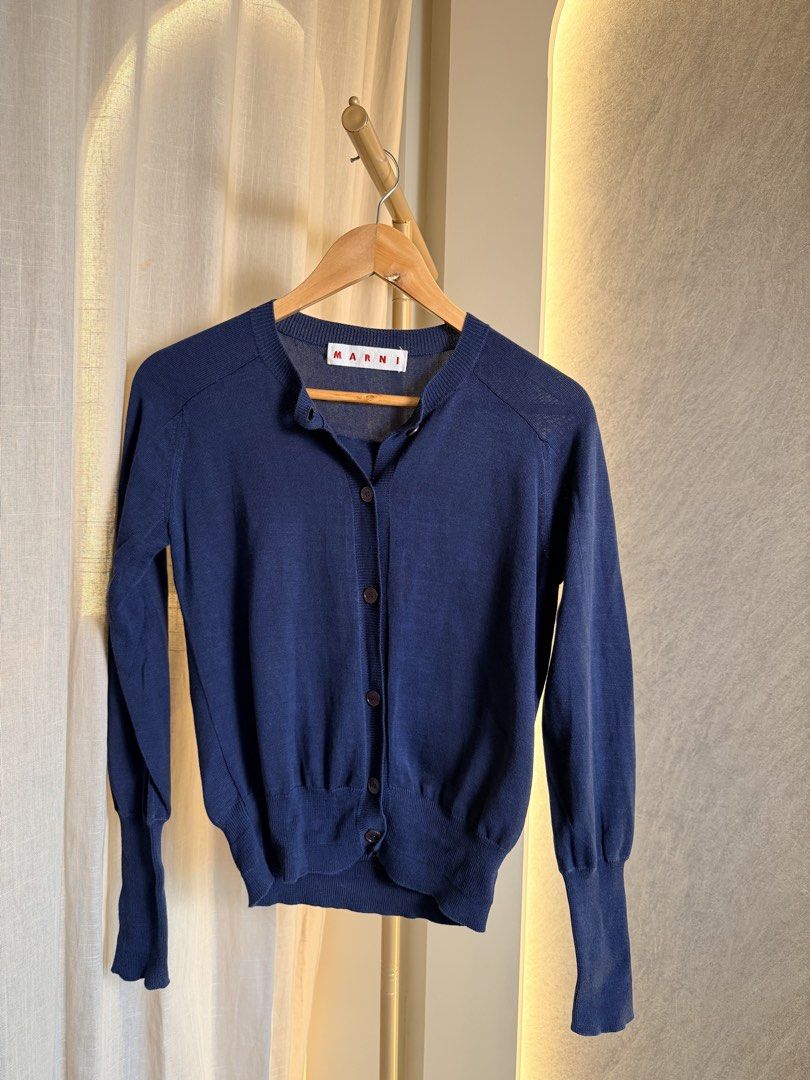 Marni cashmere button down cardigan in navy blue (Category: Longsleeves) located in Taytay. Submitted by chloweann (Listing ID 1470828184, Image 1). Description: Brand: Marni Size: Small button down navy blue cashmere fabric.