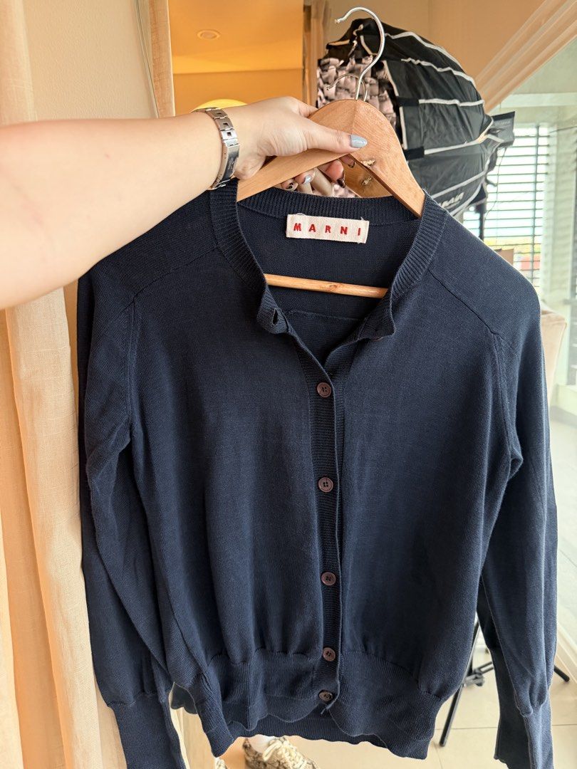 Marni cashmere button down cardigan in navy blue (Category: Longsleeves) located in Taytay. Submitted by chloweann (Listing ID 1470828184, Image 2). Description: Brand: Marni Size: Small button down navy blue cashmere fabric.
