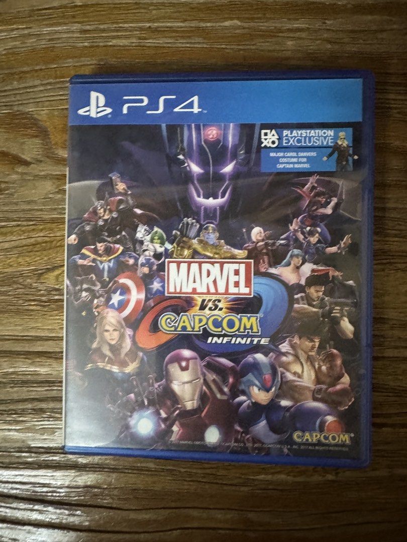 Marvel vs. Capcom: Infinite PS4 Game (Category: PlayStation) located in Las Pinas. Submitted by emdjss (Listing ID 1470817054, Image 1). Description: - Platform: PlayStation 4 (Physical Disc) - Extras: Includes paper insert with unused DLC voucher codes for Warrior Thor and Evil Ryu premium costumes - Genre: Action fighting game featuring iconic Marvel and Capcom characters - Age Rating: Rated 3 .