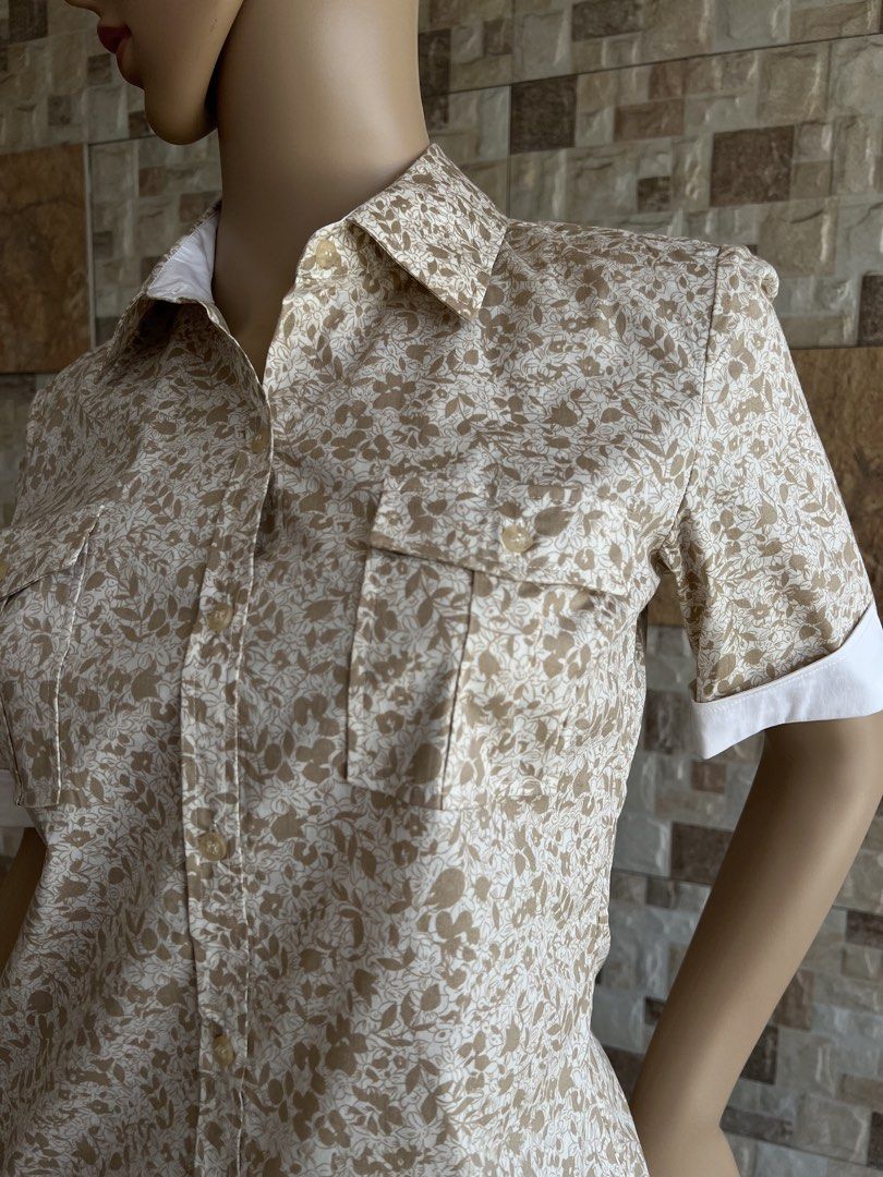 MAX MARA - POLO CAMICLE ROLLED SHORT SLEEVE BUTTON DOWN (Category: Others Tops) located in Bacolod City. Submitted by timelessbyjosh (Listing ID 1470844745, Image 2). Description: BEST FOR CASUAL OUTFITS SIZE : SMALL ACTUAL COLOR : LIGHT BROWN & WHITE COLOR RATE : 9. 5 OUT OF 10 CONDITION : NEAR NEW MATERIAL : 97 % COTTON & 3 % ELASTANE MADE IN : JAPAN FLAWS : NONE DIMENSIONS LENGTH - 26 WIDTH - 17. 5 MEASUREMENT TAKEN WHILE LAYING FLAT. PLEASE C