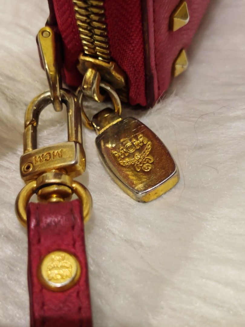 Mcm Continental Zip Around Leather Gold Studs Wallet (Category: Luxury Bags & Wallets) located in Manila. Submitted by xanderzluxcollection (Listing ID 1470890738, Image 3). Description: 🔴Authentic MCM hot pink leather continental zip- around wallet featuring a decorative bow accent and gold-tone pyramid studs👝 🔴Good Condition,No Inclusion 🔴Fb Acct.Xander M.Gatchalian.09606022191.