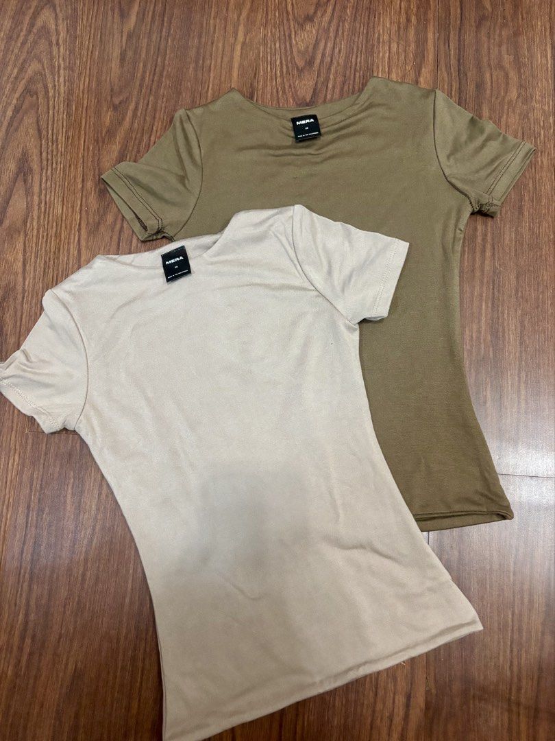 MERA Basic renata T-Shirts Bundle Olive Green Beige Size XS (Category: Shirts) located in San Juan City. Submitted by hellokitty_454 (Listing ID 1470873943, Image 2). Description: - Set of 2 basic fitted tees ( taupe and coffee - Brand: MERA - Size: XS - Style: Short sleeves, round neckline - Origin: Made in the Philippines - Great neutral colors for daily casual outfits - Sold as a set.